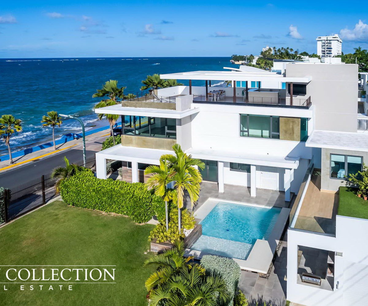 An idyllic Oceanfront Modern Mansion with sublime and serene ocean vistas and sounds, corner lot in Park Boulevard next to Ocean Park. Puerto Rico Luxury Collection Real Estate