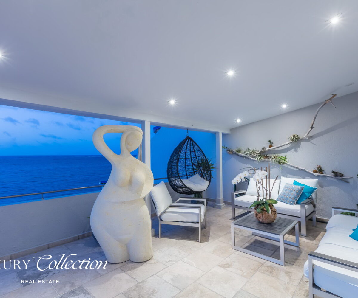 Oceanfront Penthouse for sale with stunning ocean views. 3 bedrooms, 3.5 bathrooms, terrace, entertainment room, and infinity plunge pool. LUXURY COLLECTION REAL ESTATE PUERTO RICO