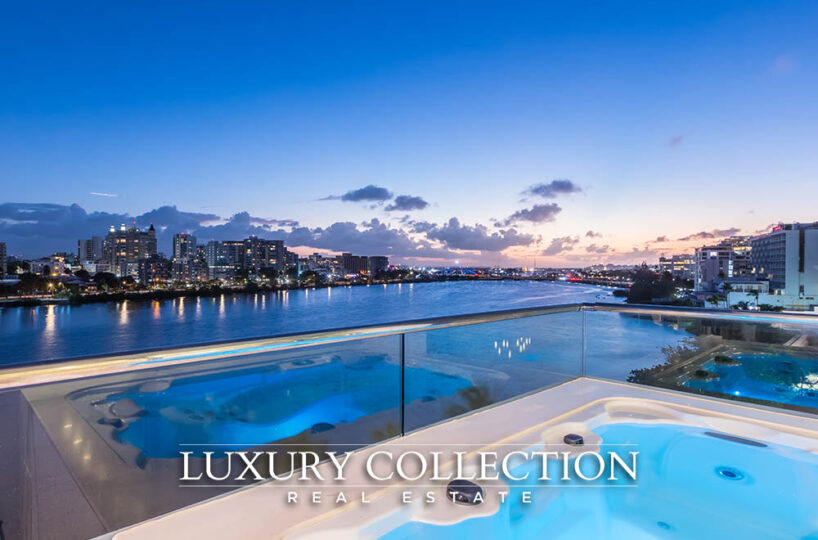 Peninsula waterfront apartment for rent luxury collection real estate Puerto Rico Waterfront Condo for rent with 4 bedrooms, 5.1 bathrooms and maid room and terrace with water views to the Condado Lagoon and Atlantic Ocean.