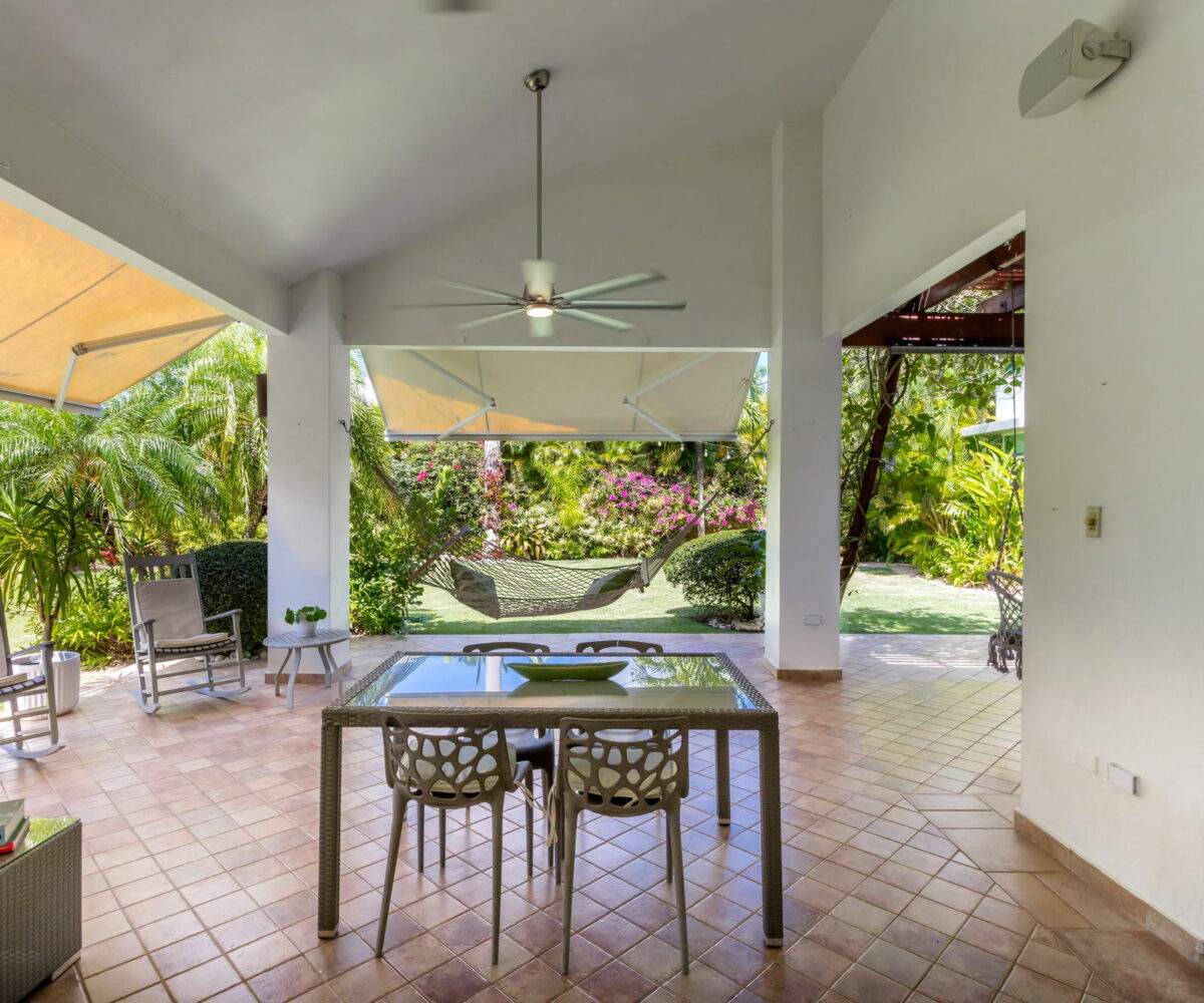 Paseo Las Palmas house at Dorado, Puerto Rico for sale. 4 bedrooms, 3.5 full bathrooms, covered terrace with carefully groomed landscaping.