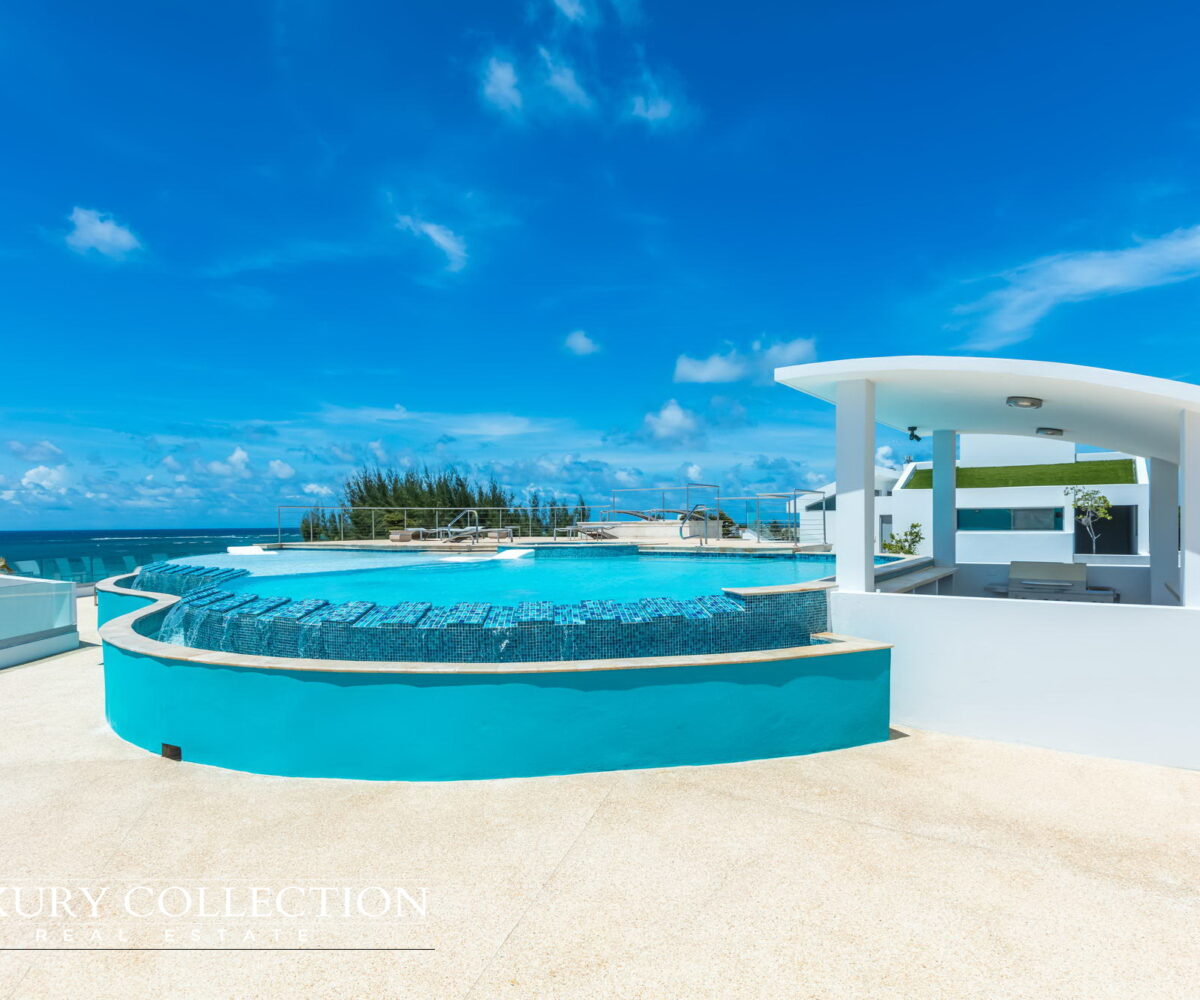 Oceanfront garden apartment for sale with views of the Atlantic Ocean. 3 bedrooms, 3.5 bathrooms, ocean front patio, Punta Las Marias, Condado PUERTO RICO Luxury Collection Real Estate