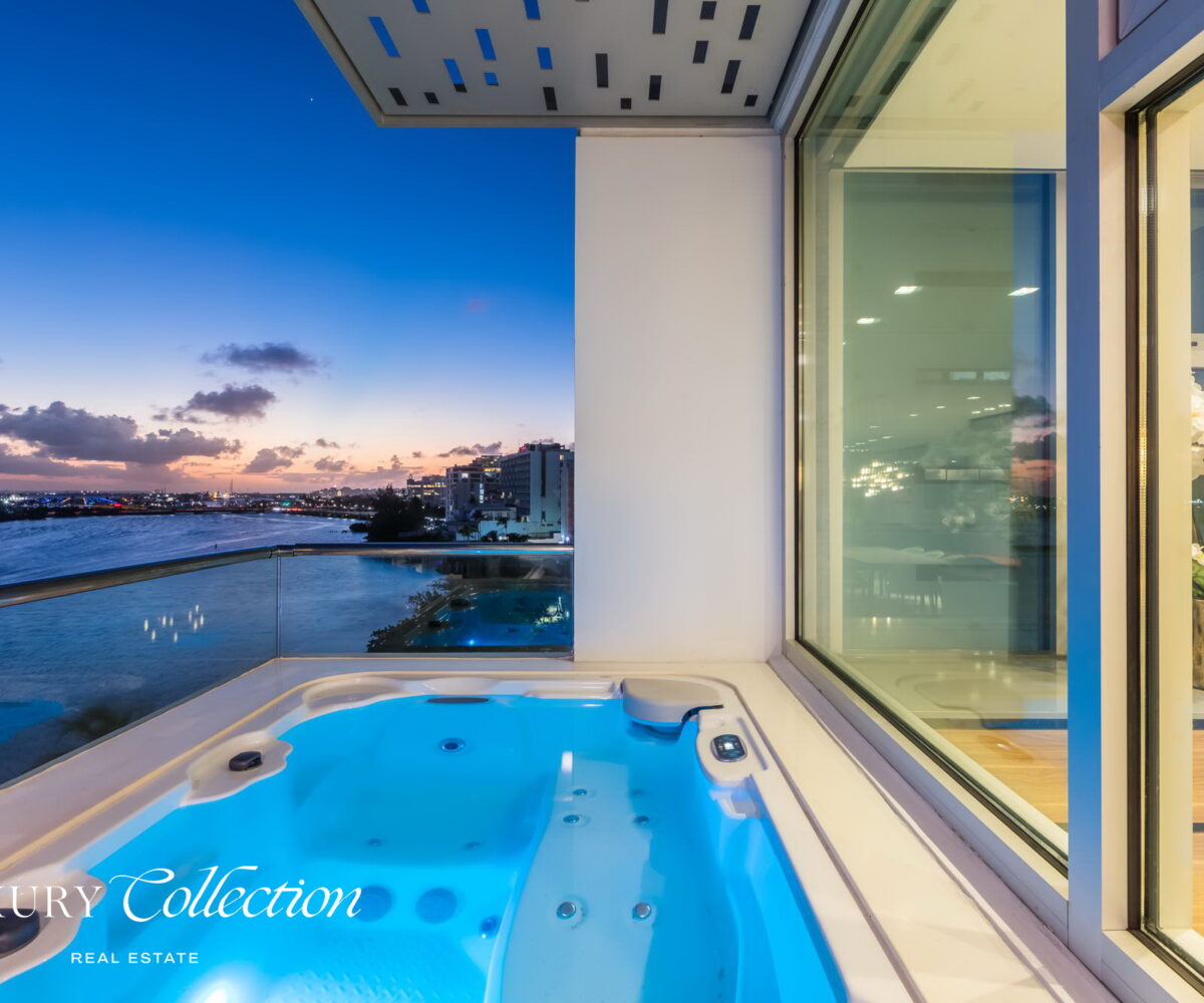 Peninsula waterfront apartment for rent luxury collection real estate Puerto Rico Waterfront Condo for rent with 4 bedrooms, 5.1 bathrooms and maid room and terrace with water views to the Condado Lagoon and Atlantic Ocean.