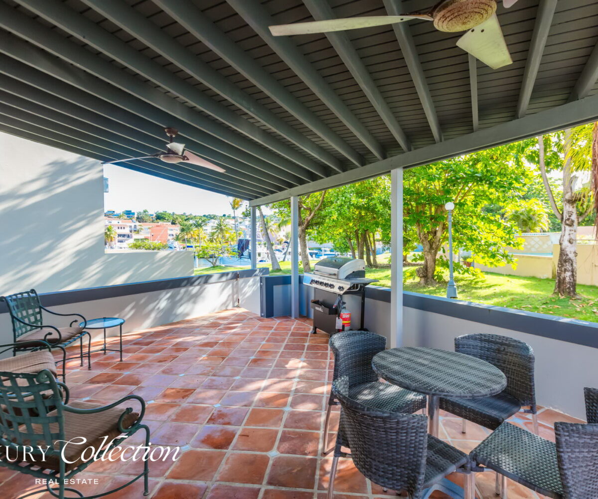 Palmas del Mar, four-bedroom villa for sale boasting a private boat slip measuring 150 feet long and 20 feet wide. Luxury Collection Real Estate Puerto Rico