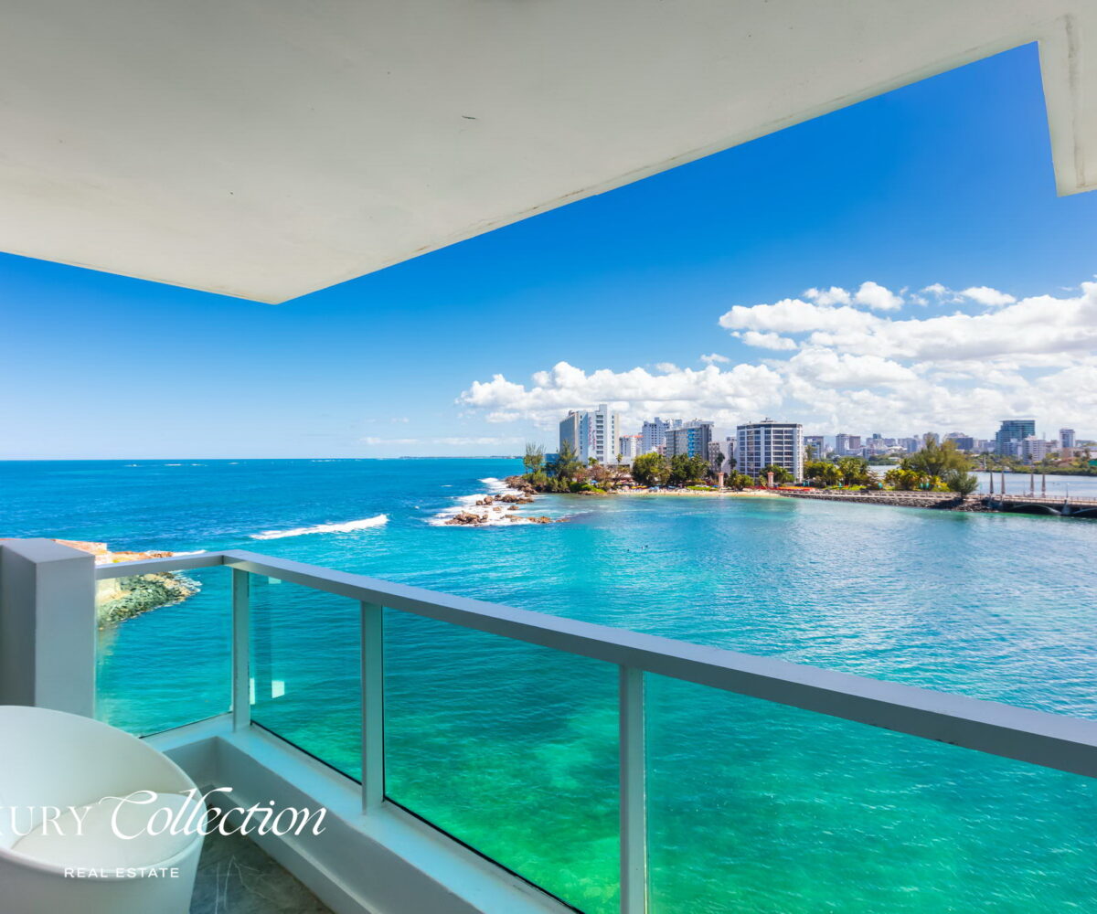 CONDADO LAGOON VILLAS- 2 BEDROOMS 2.5 BATHS kitchen and balcony with ocean views.