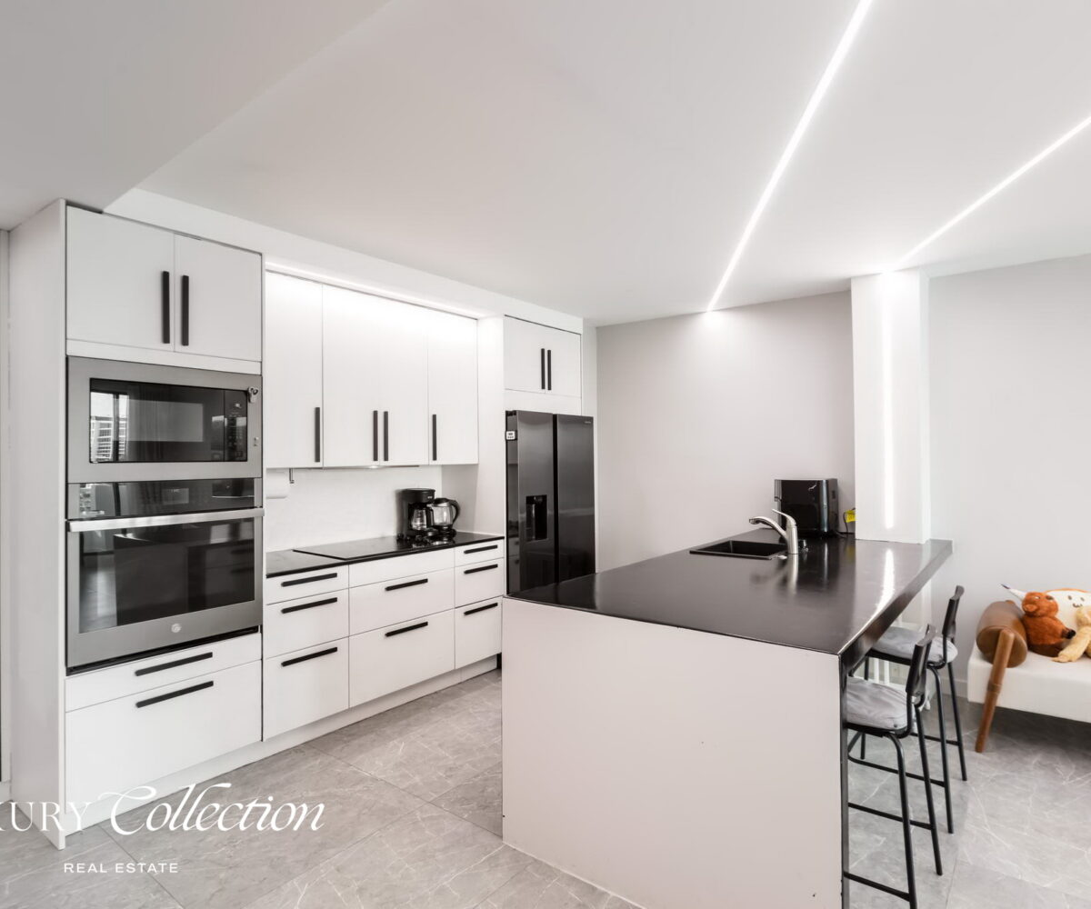 CONDADO LAGOON VILLAS- 2 BEDROOMS 2.5 BATHS kitchen and balcony with ocean views.