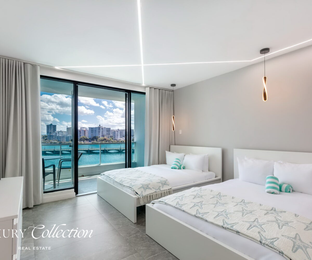 CONDADO LAGOON VILLAS- 2 BEDROOMS 2.5 BATHS kitchen and balcony with ocean views.