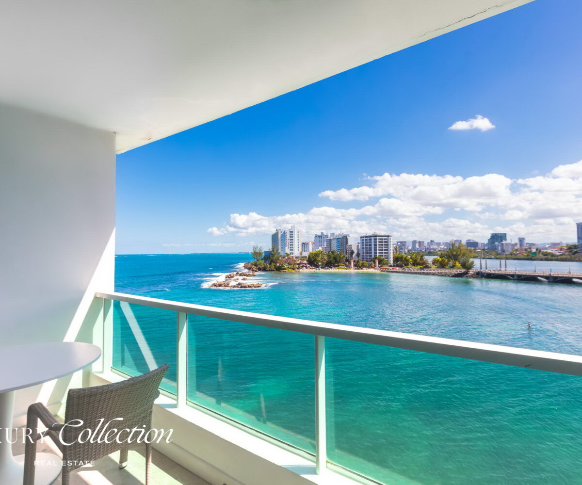 CONDADO LAGOON VILLAS- 2 BEDROOMS 2.5 BATHS kitchen and balcony with ocean views.
