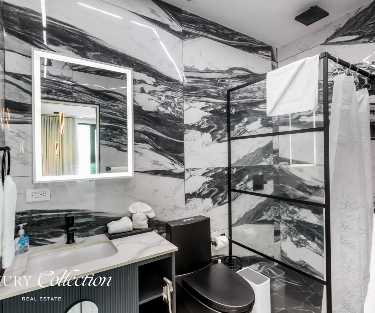 CONDADO LAGOON VILLAS- 2 BEDROOMS 2.5 BATHS kitchen and balcony with ocean views.