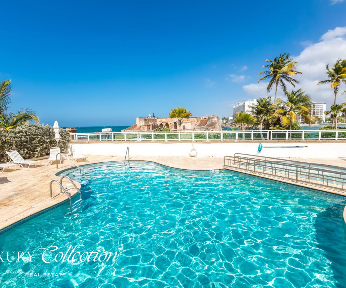 CONDADO LAGOON VILLAS- 2 BEDROOMS 2.5 BATHS kitchen and balcony with ocean views.