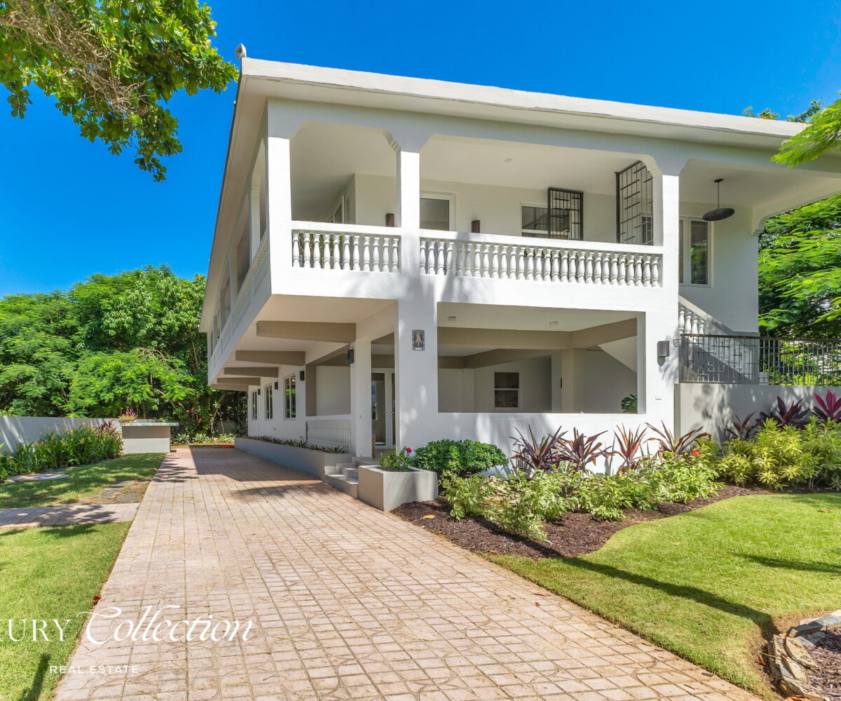 2-story beachfront home with 5 bedrooms, 4 baths, 2 kitchens, and an abundant outdoor space for entertaining in Vega Baja Puerto Rico.