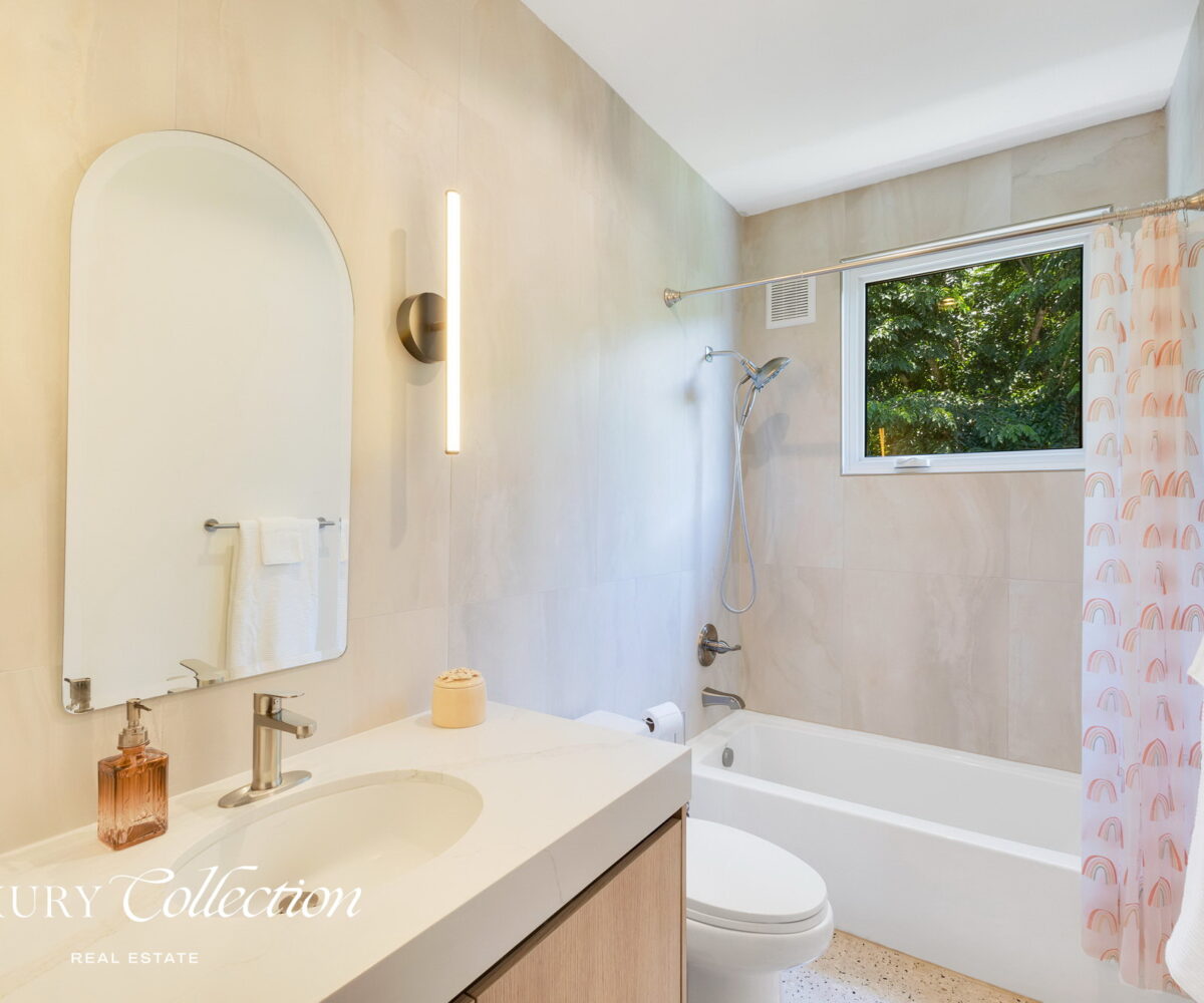 2-story beachfront home with 5 bedrooms, 4 baths, 2 kitchens, and an abundant outdoor space for entertaining in Vega Baja Puerto Rico.