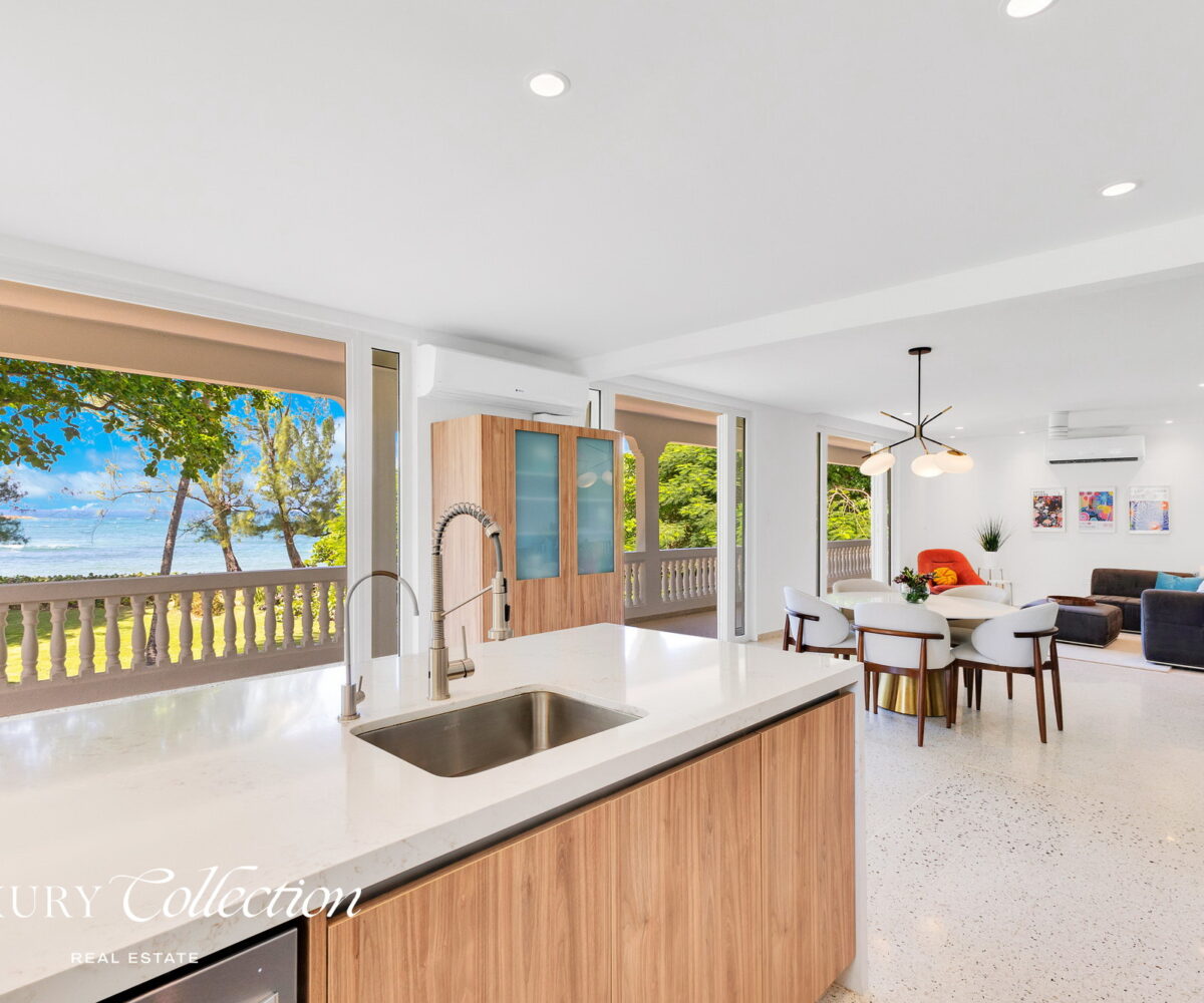 2-story beachfront home with 5 bedrooms, 4 baths, 2 kitchens, and an abundant outdoor space for entertaining in Vega Baja Puerto Rico.