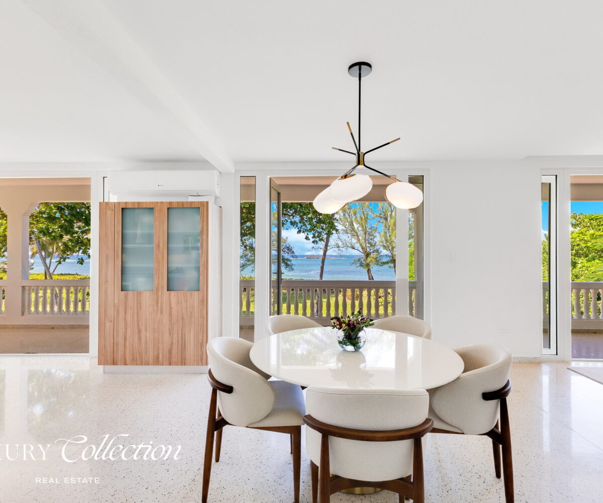 2-story beachfront home with 5 bedrooms, 4 baths, 2 kitchens, and an abundant outdoor space for entertaining in Vega Baja Puerto Rico.