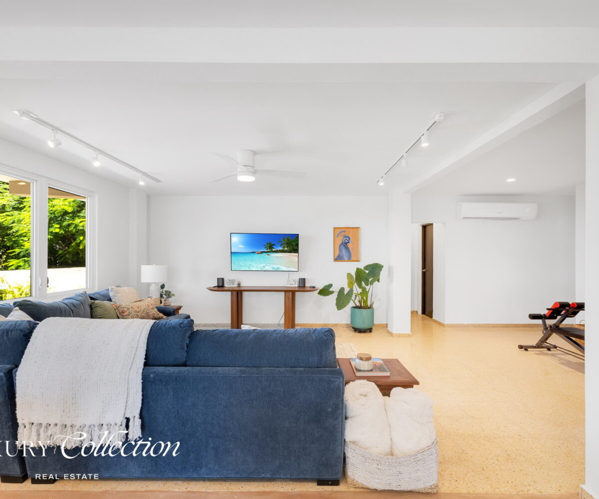 2-story beachfront home with 5 bedrooms, 4 baths, 2 kitchens, and an abundant outdoor space for entertaining in Vega Baja Puerto Rico.