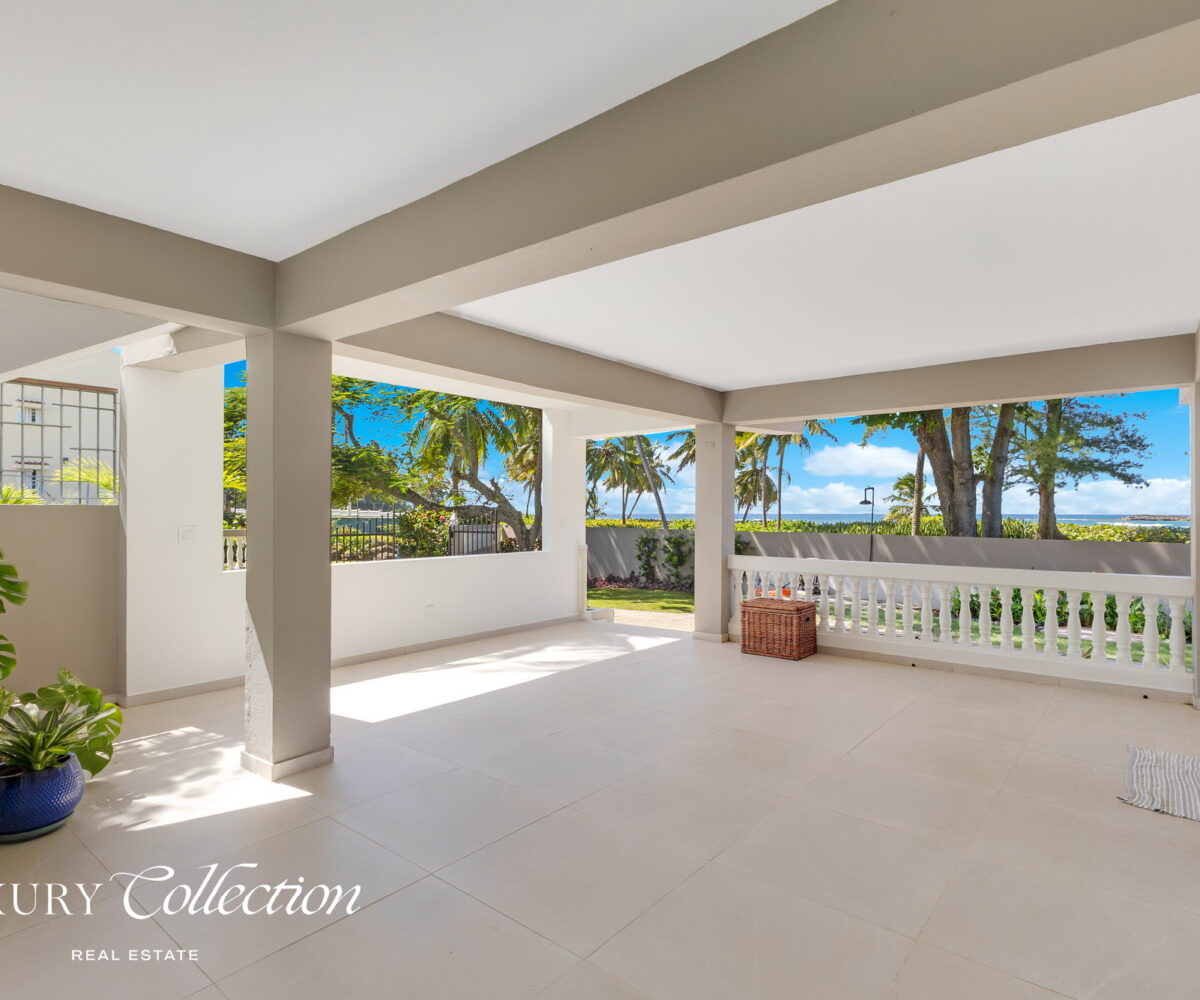 2-story beachfront home with 5 bedrooms, 4 baths, 2 kitchens, and an abundant outdoor space for entertaining in Vega Baja Puerto Rico.