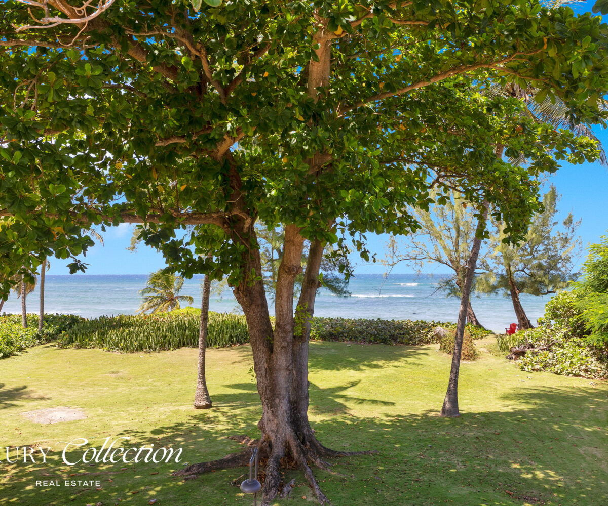 2-story beachfront home with 5 bedrooms, 4 baths, 2 kitchens, and an abundant outdoor space for entertaining in Vega Baja Puerto Rico.