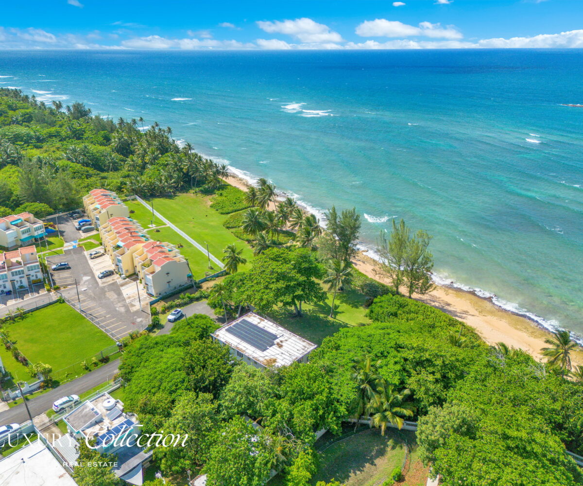 2-story beachfront home with 5 bedrooms, 4 baths, 2 kitchens, and an abundant outdoor space for entertaining in Vega Baja Puerto Rico.