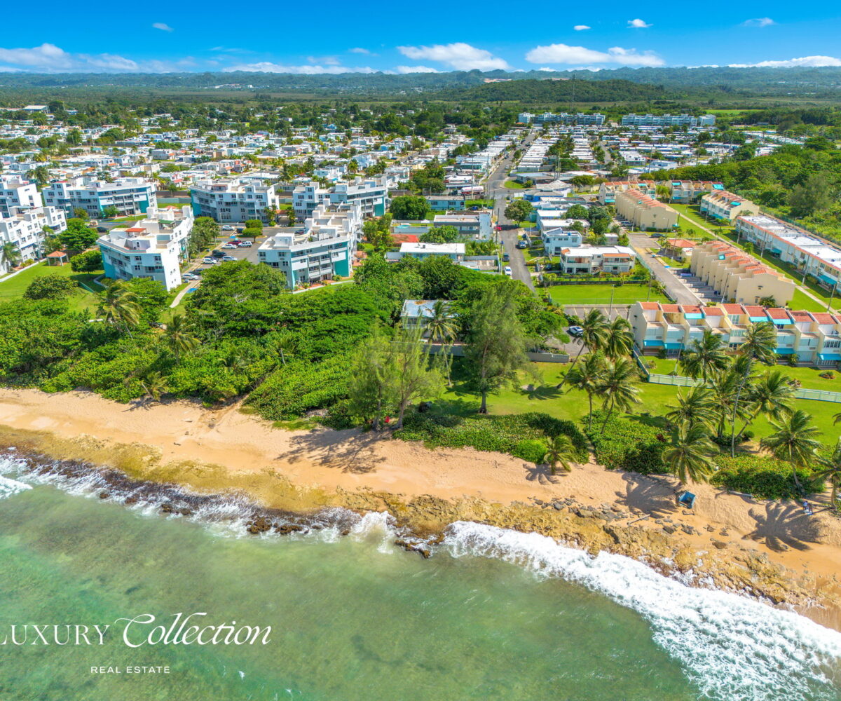 2-story beachfront home with 5 bedrooms, 4 baths, 2 kitchens, and an abundant outdoor space for entertaining in Vega Baja Puerto Rico.