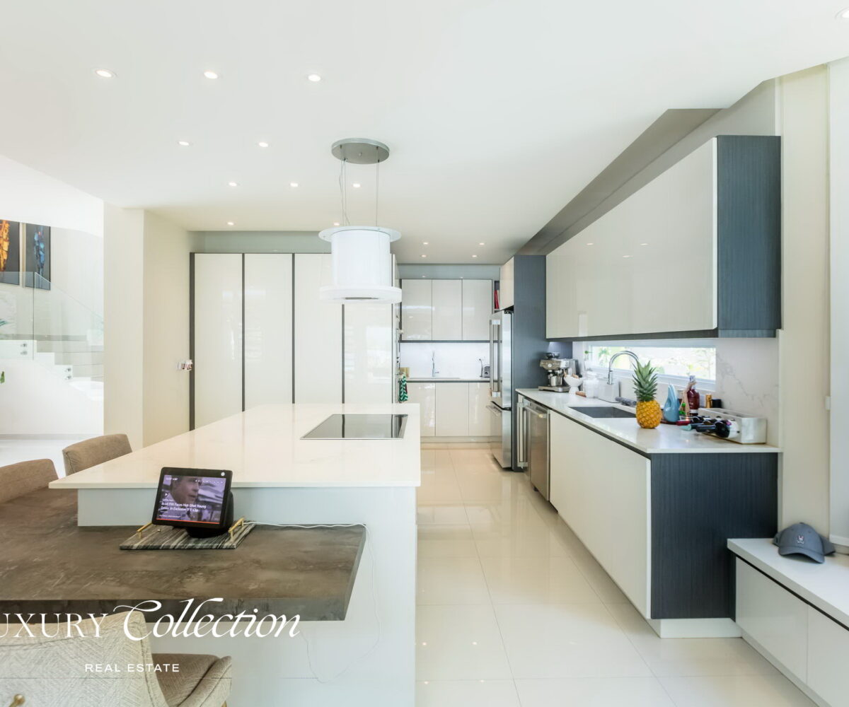 Paseo San Juan House for sale Puerto Rico. Remodeled 5,095 sq. ft. residence on a 945 sq. meter lot. 4 beds (convertible to 5) and 3.5 baths. Alex Herrera Luxury Collection Real Estate.