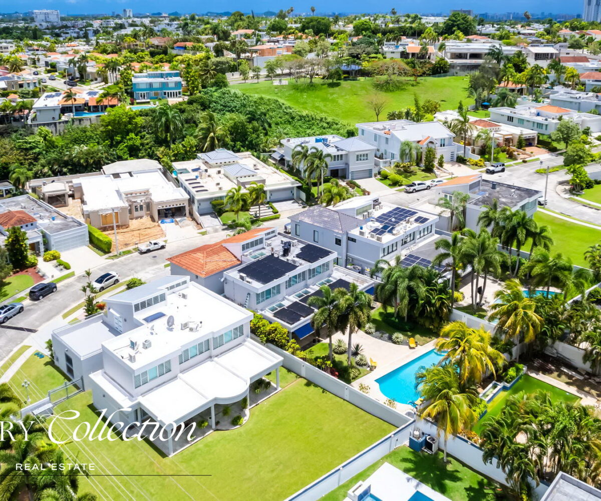 Paseo San Juan House for sale Puerto Rico. Remodeled 5,095 sq. ft. residence on a 945 sq. meter lot. 4 beds (convertible to 5) and 3.5 baths. Alex Herrera Luxury Collection Real Estate.