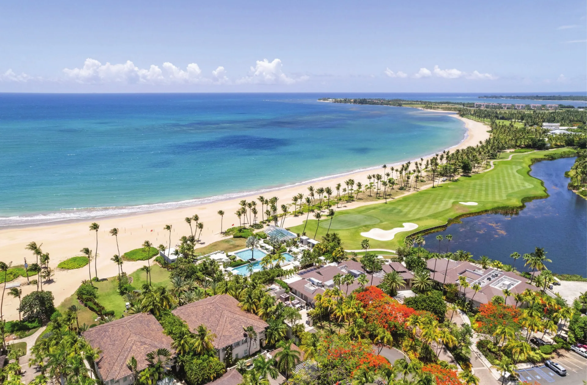 Aerial view of Bahia Beach resort, golf course and beachfront in Rio Grande, Puerto Rico